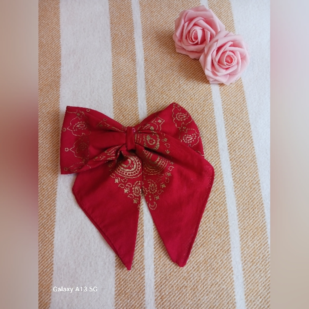 Jumbo scarf bow in color: red with folk dance headdress brooch.